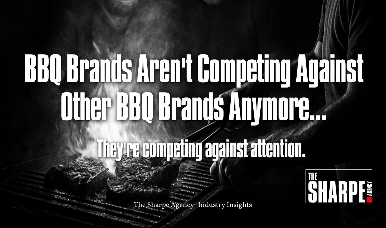 BBQ Brands Arent Competing Against Other BBQ Brands Anymore - The Sharpe Agency Grayscale ad banner: bold headline claims BBQ brands compete for attention, with a grill and tongs in the background and The Sharpe Agency logo on the right.